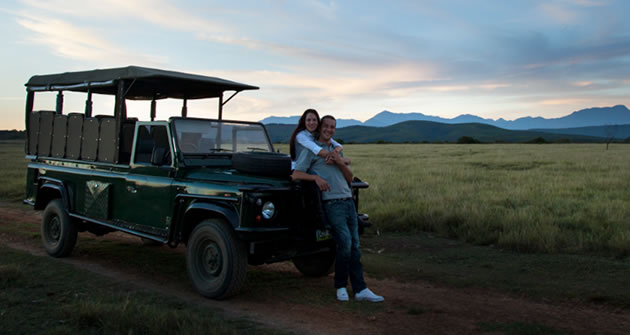 Couple on game drive safari in Plett Game Reserve